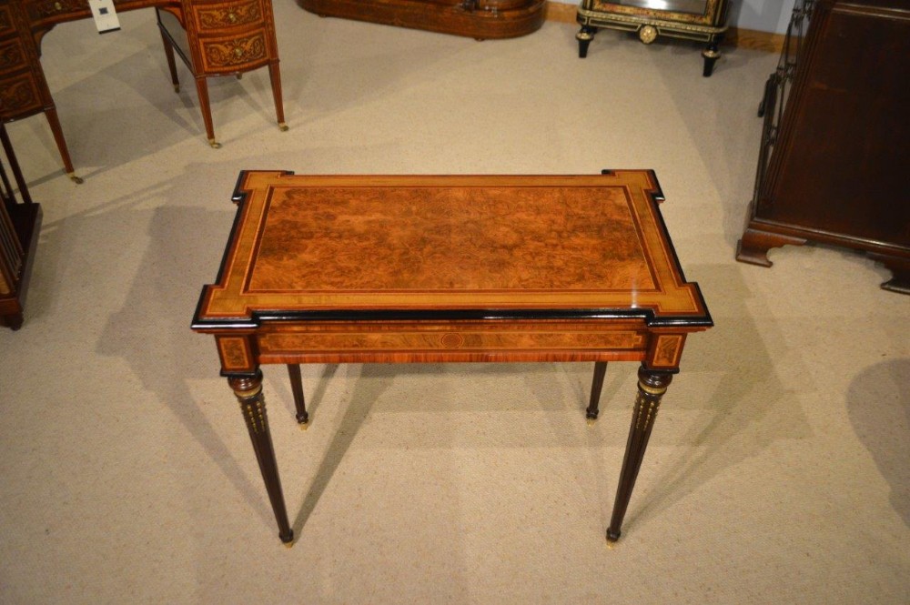 A fine quality burr walnut, purple heart, sycamore and kingwood Victorian Period antique fold over card table