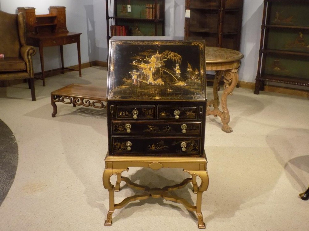 A chinoiserie lacquered Edwardian Period bureau on stand.