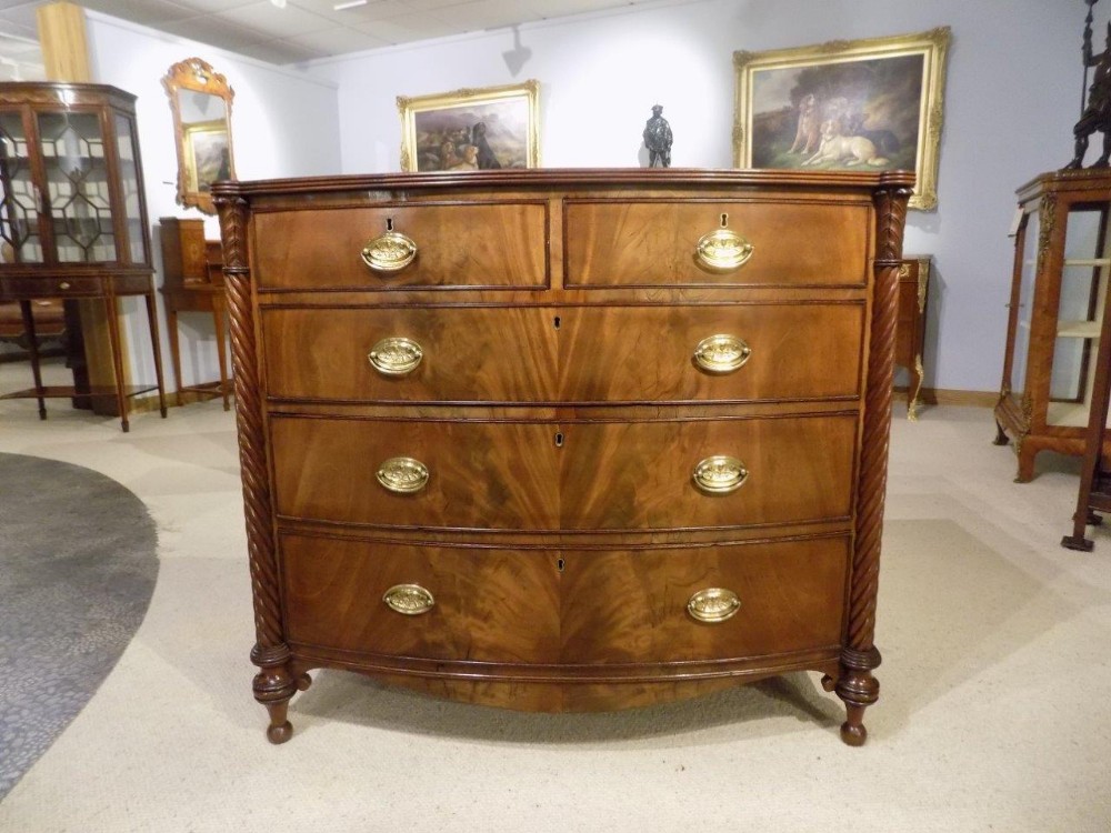 A beautiful Scottish Regency Period Flame mahogany bow front chest of drawers.