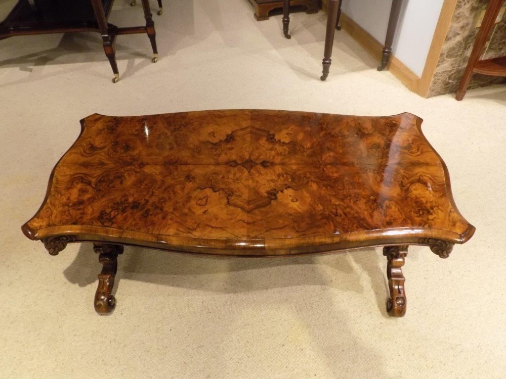 A beautiful burr walnut Victorian Period antique coffee table.