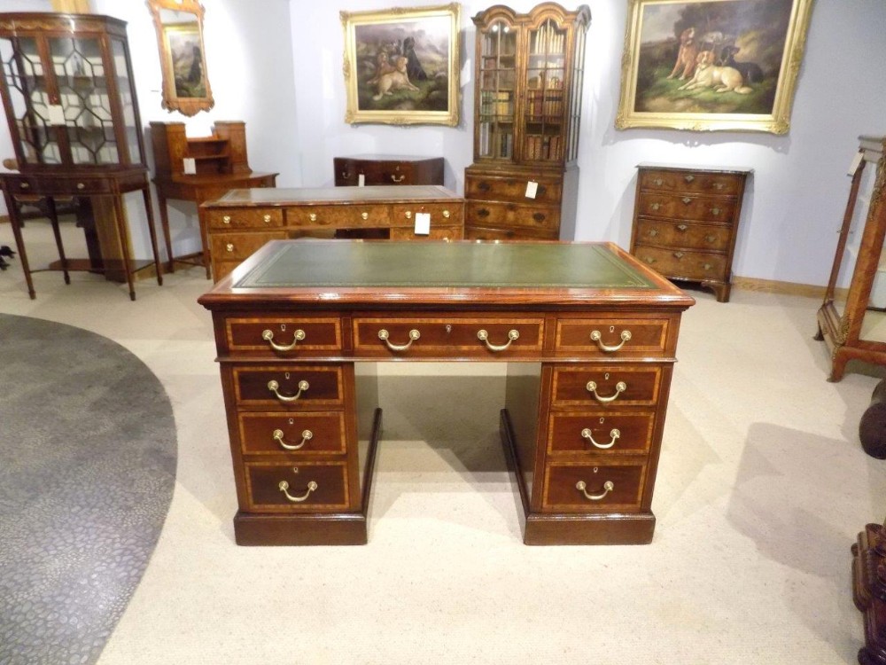 A fine quality mahogany & satinwood inlaid Edwardian Period pedestal desk.