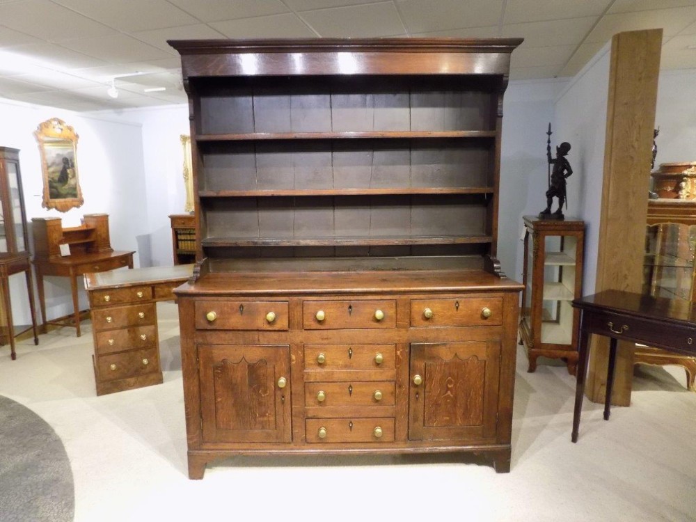 An early 19th Century antique Welsh dresser and rack