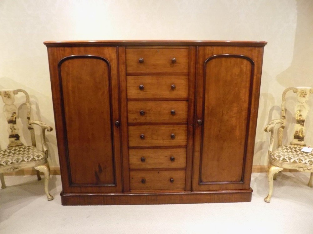 A mahogany Victorian Period gentleman's combination linen press.