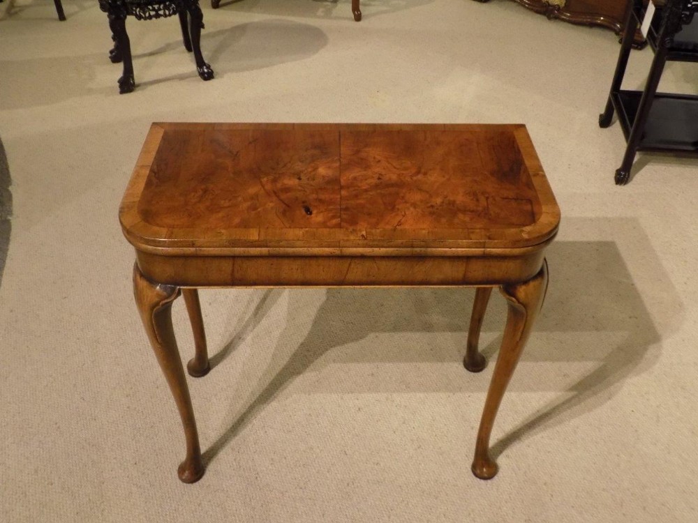 A burr walnut & walnut George I Style antique fold over card table