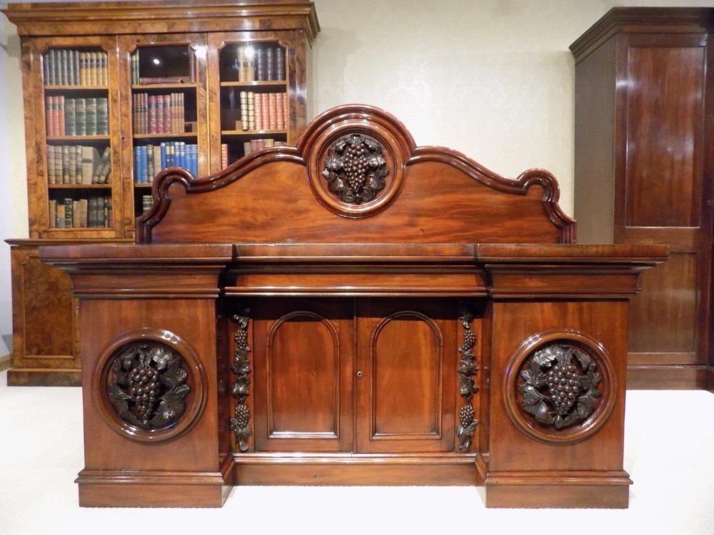 A superb Quality figured mahogany Victorian Period four door antique sideboard