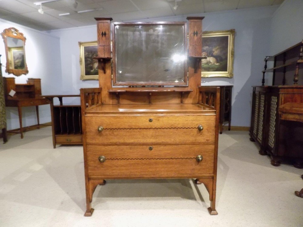 An oak Arts & Crafts Period Shapland & Petter Dressing Table.