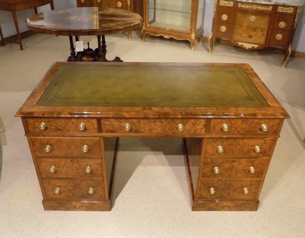 A Superior quality burr walnut Victorian Period antique pedestal desk.