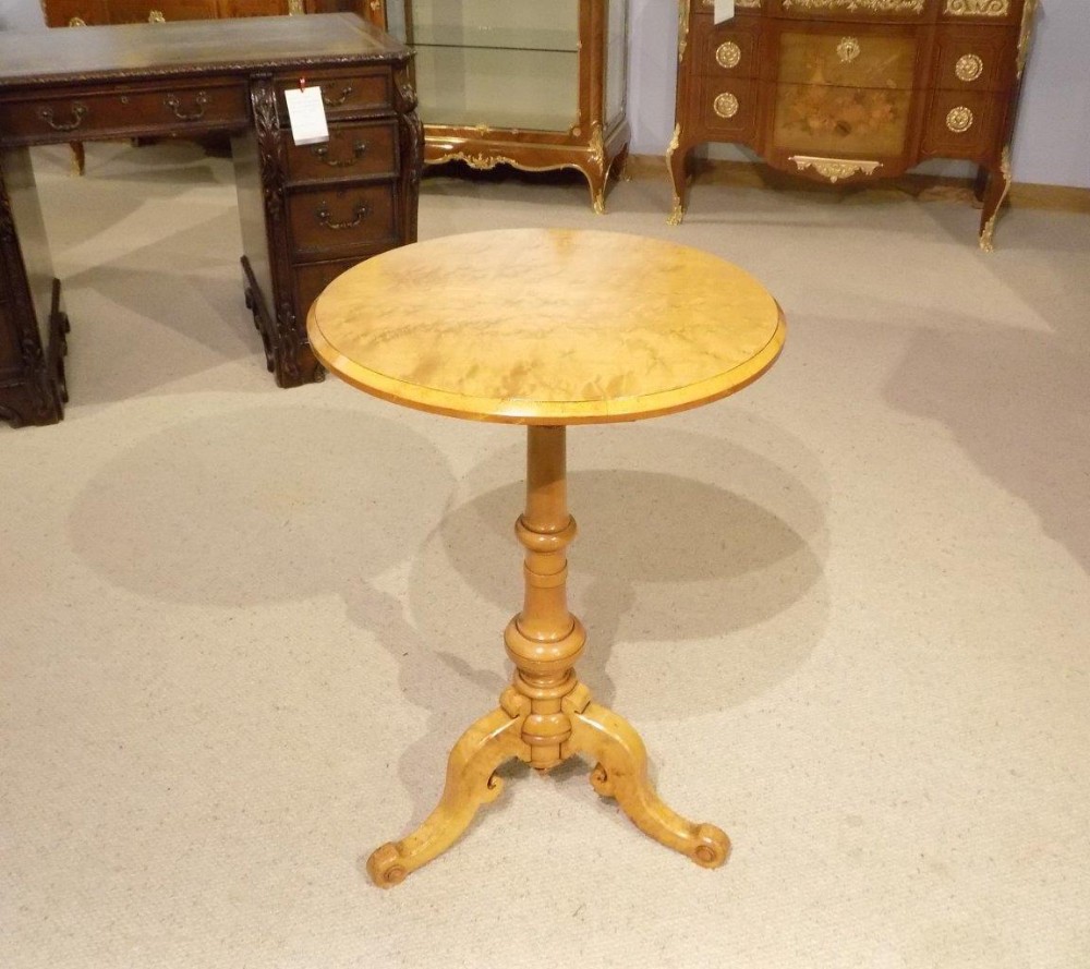 An unusual & rare Victorian Period birds eye maple tripod table