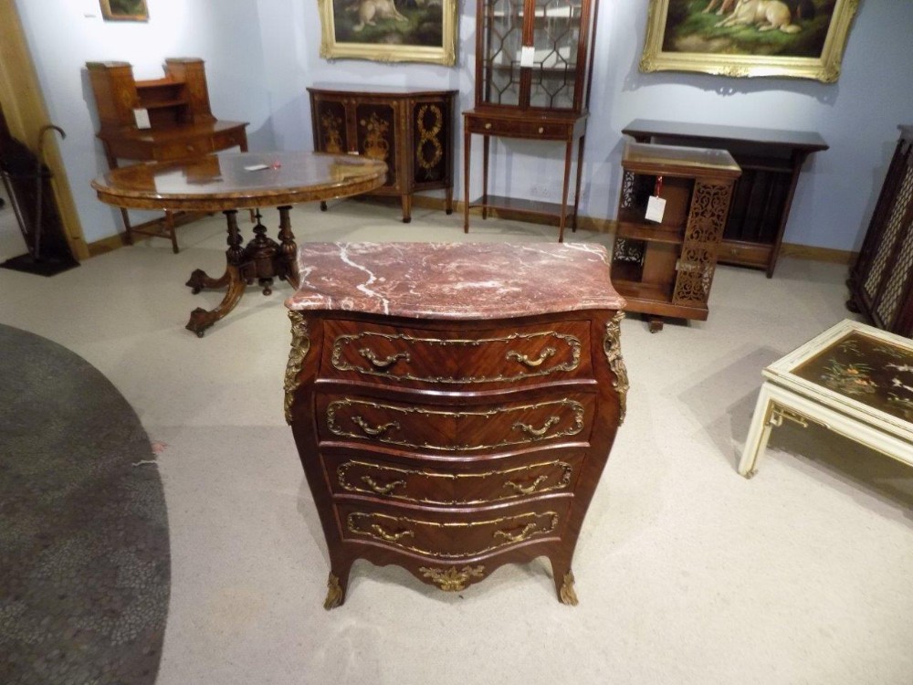 A superb quality rosewood and ormolu mounted French marble top chest.