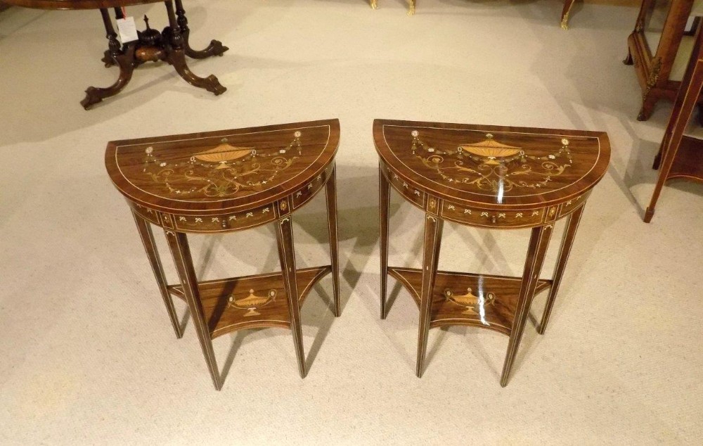 An extremely rare and fine pair of rosewood, marquetry & pen-work inlaid Edwardian Period demi lune side tables by Edwards & Roberts of London