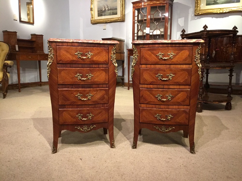 A fine pair of Late 19th Century French kingwood & ormolu mounted bedside chests