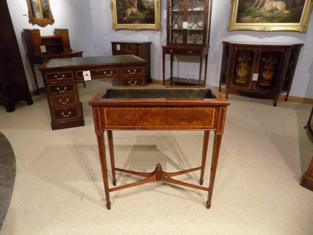 A flame mahogany inlaid Edwardian Period jardiniere