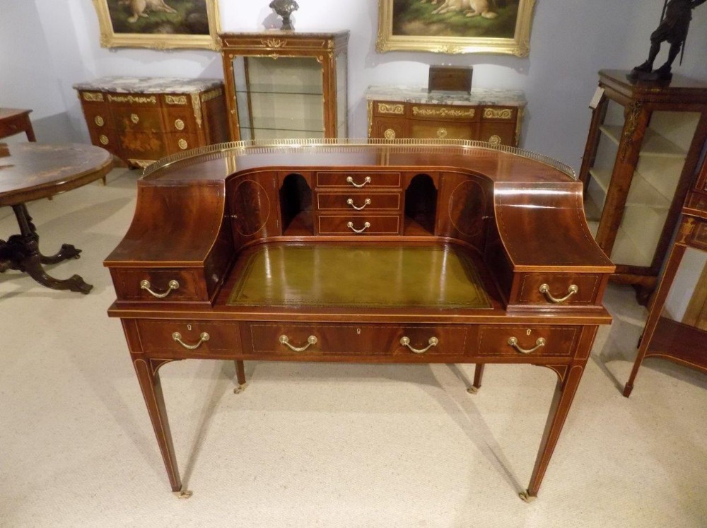 A Fine quality Edwardian Period flamed mahogany carlton house desk