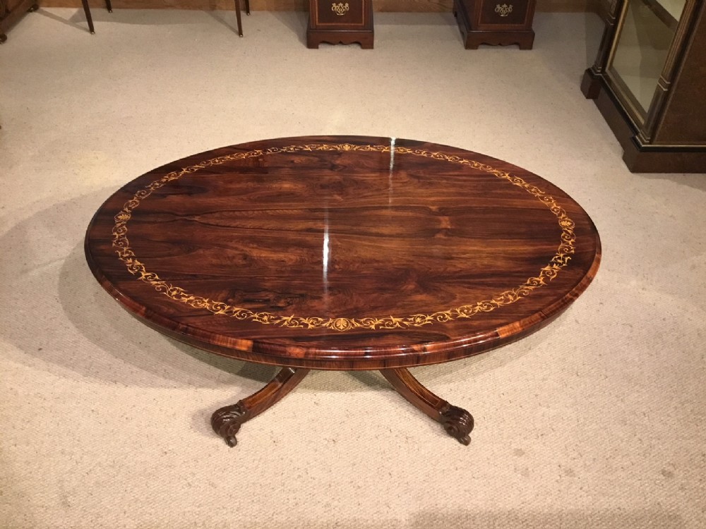 A superb quality rosewood and marquetry inlaid Victorian Period antique coffee table.