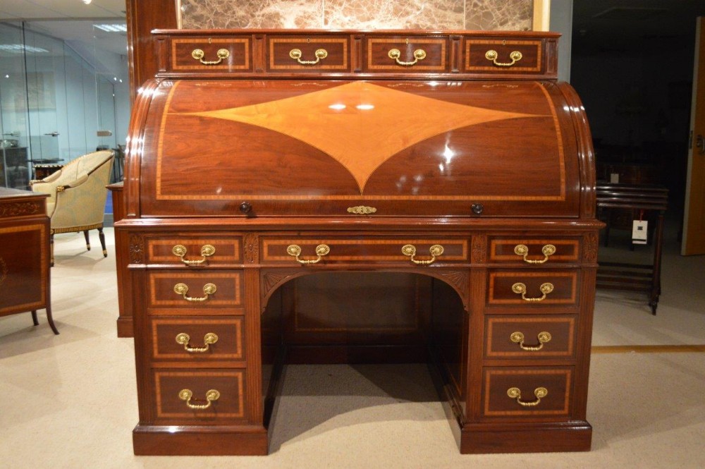 A stunning quality large Late Victorian Period  mahogany and satinwood cylinder desk