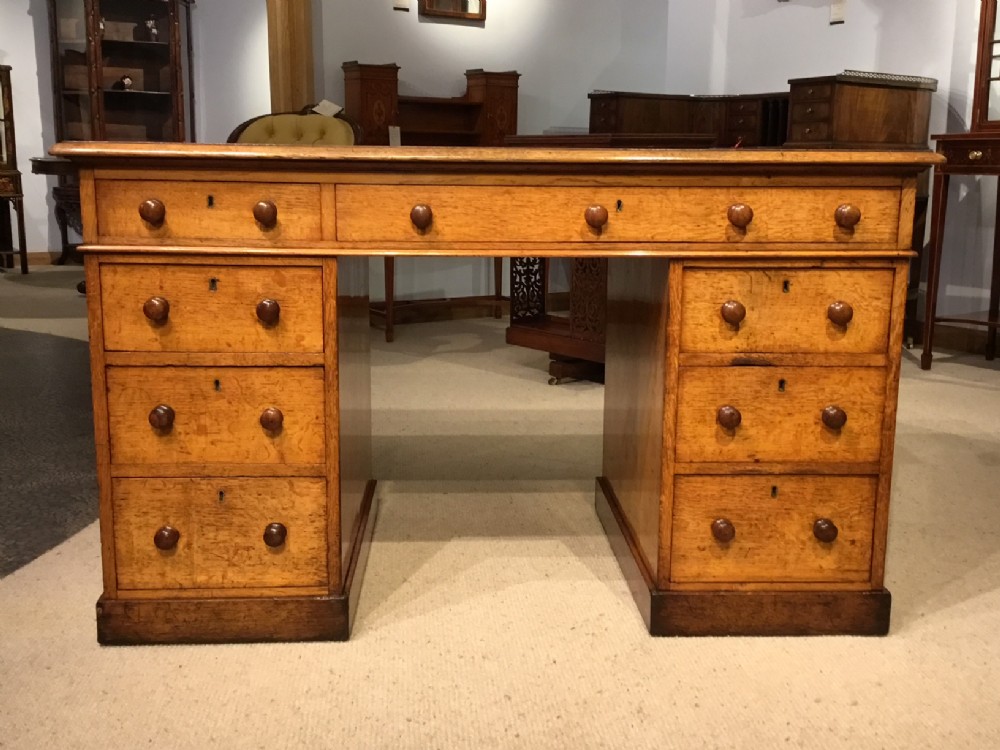 A good oak Victorian Period antique pedestal desk