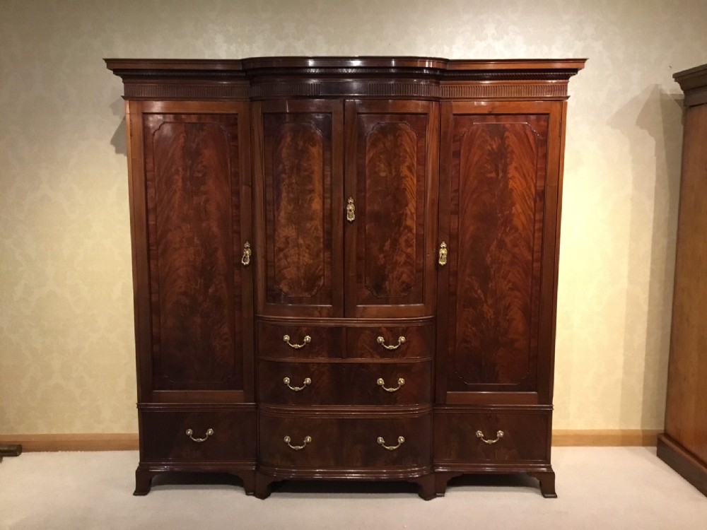 A mahogany Edwardian Period breakfront wardrobe by Howard & Sons Of London