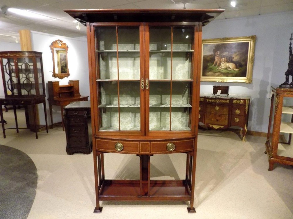 A fine quality mahogany Arts & Crafts Period cabinet by Shapland & Petter Of Barnstaple.