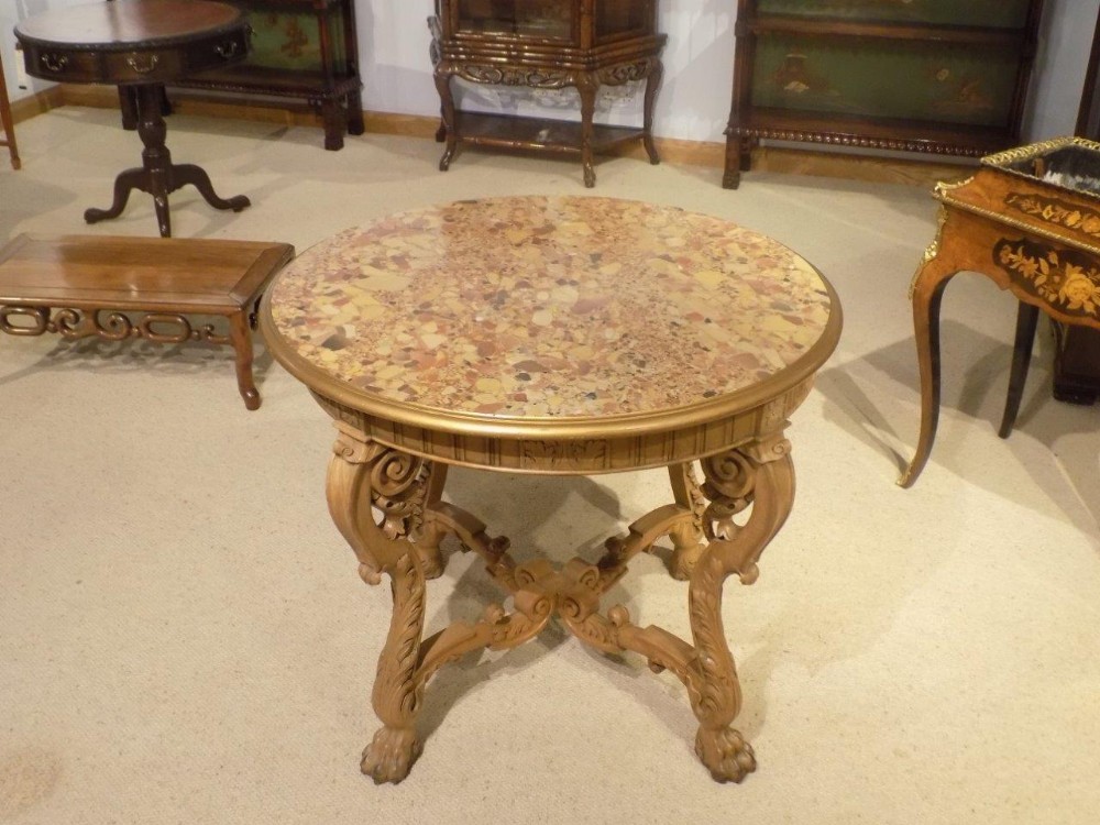 A good French walnut 19th Century marble topped centre table. 
