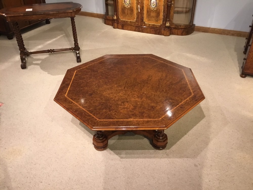 A burr walnut Victorian Period octagonal coffee table