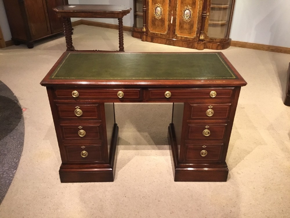 A Fine quality Shapland & Petter mahogany inlaid writing desk