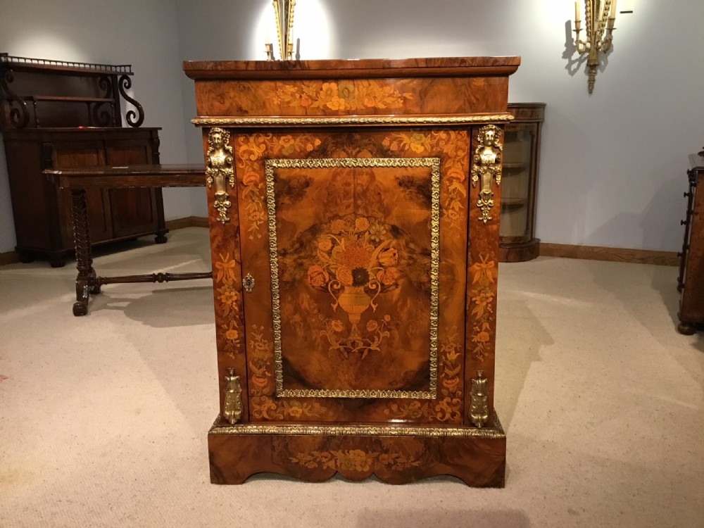 A superb quality Victorian Period burr walnut and marquetry pier cabinet. 