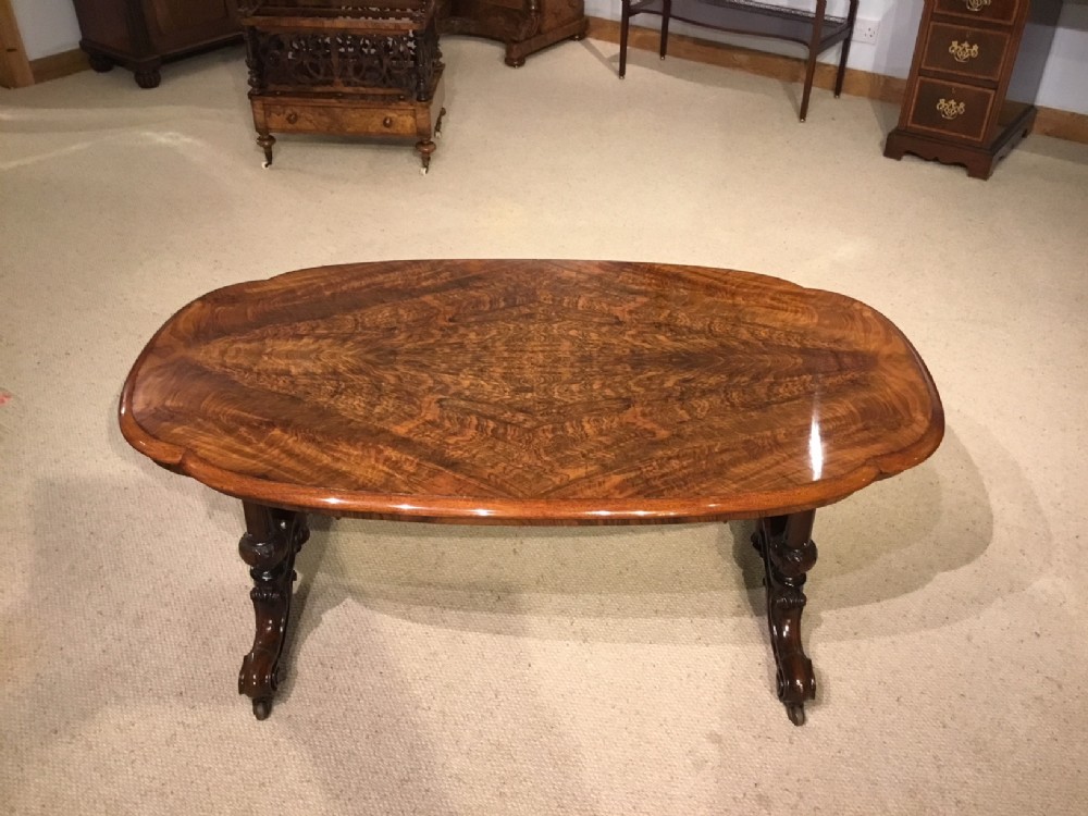 A beautiful burr walnut Victorian Period antique coffee table.