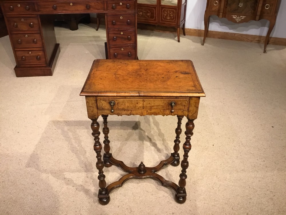 A fine quality burr oak and walnut William and Mary Style antique side table