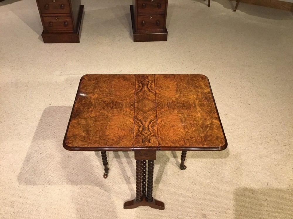 A beautiful burr walnut Victorian Period baby Sutherland table.