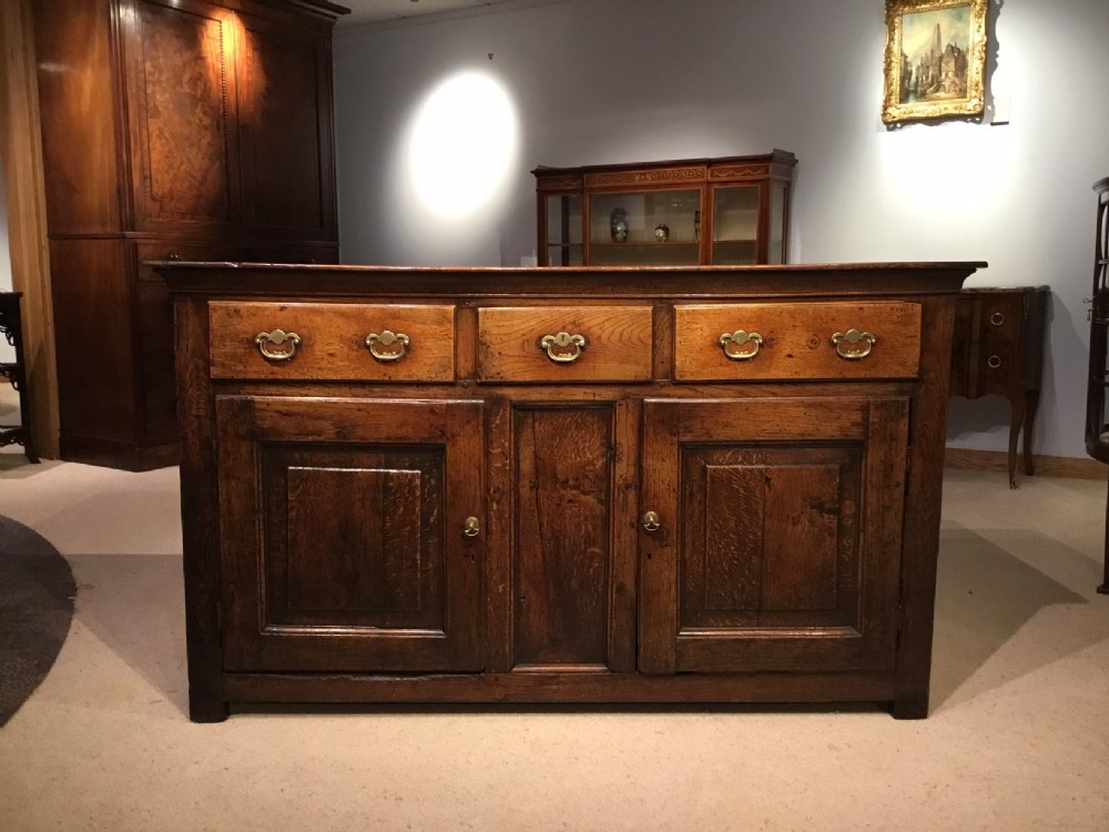 An oak Mid 18th Century English dresser base of fabulous colour and patination