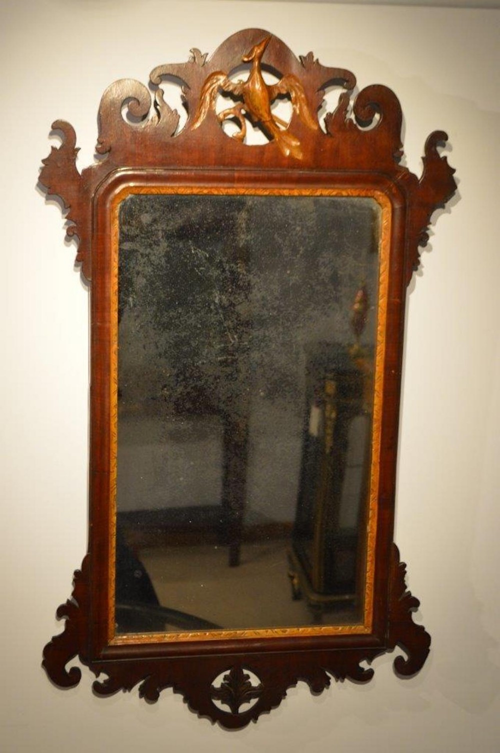 A George III Period mahogany fretwork wall mirror