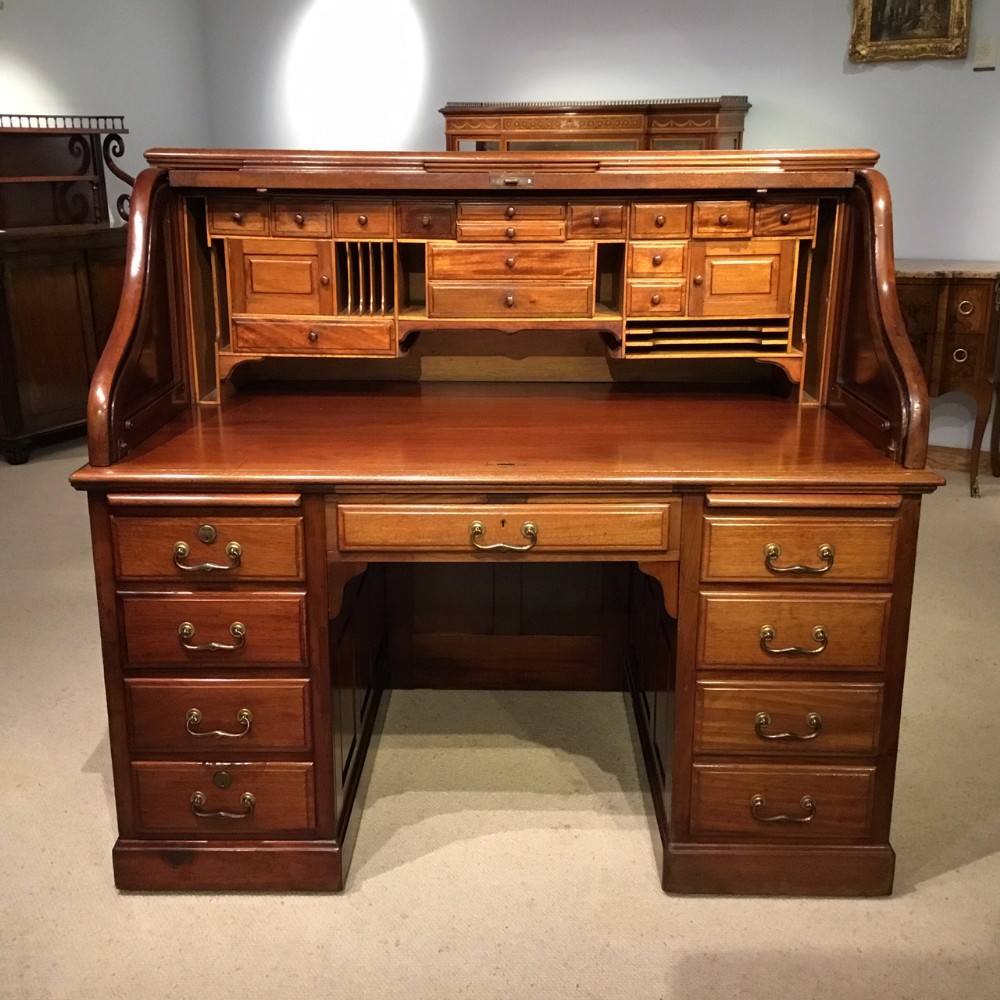 A good mahogany Edwardian Period roll top desk.