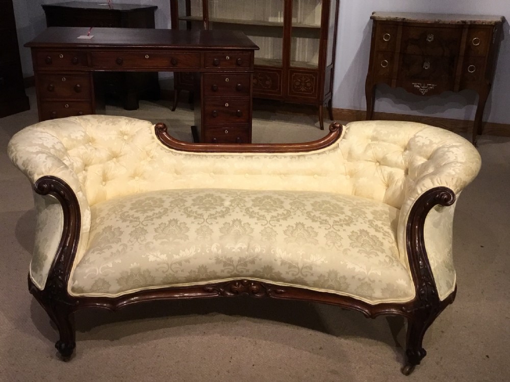 A fine quality walnut Victorian Period boudoir sofa