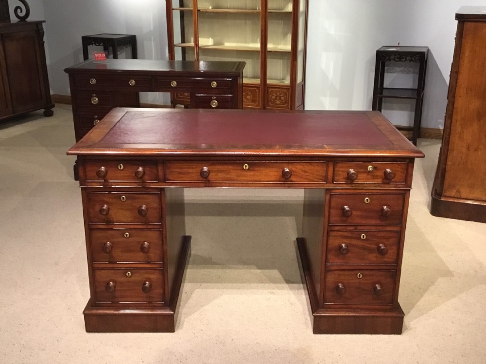 A fine quality mahogany Victorian Period antique pedestal desk
