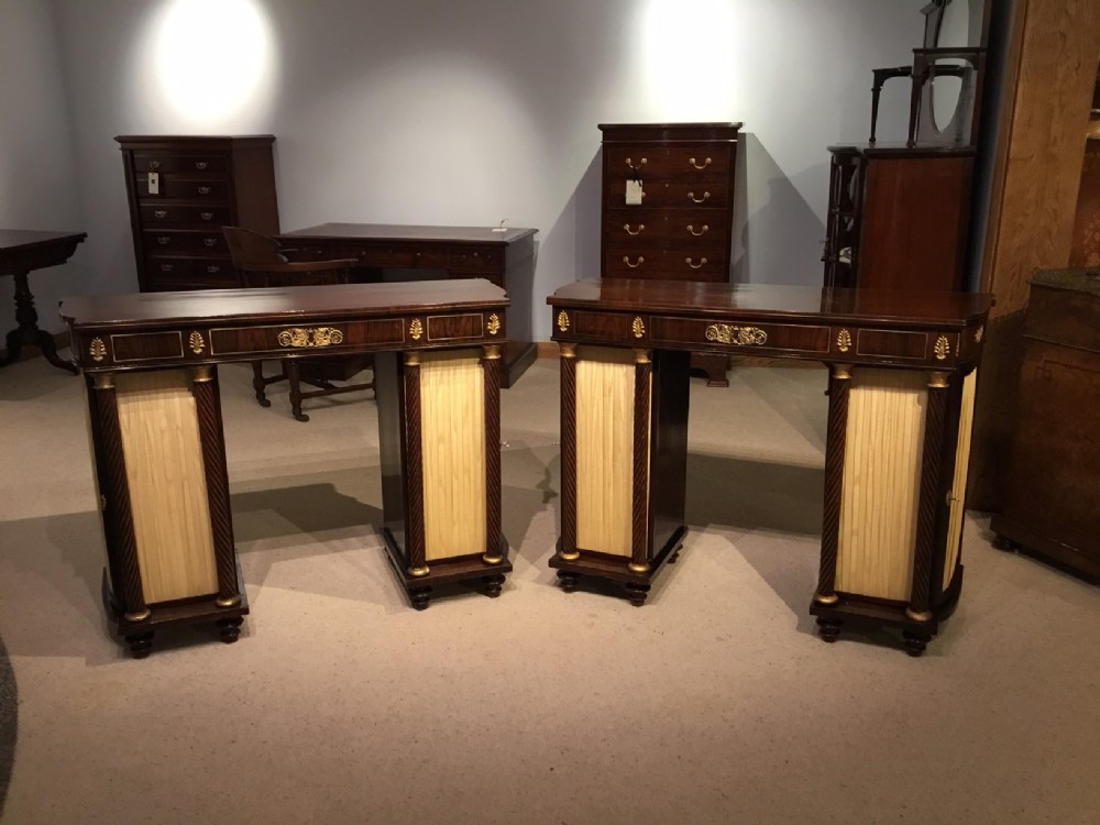 A pair of rosewood brass inlaid Regency Period antique side cabinets