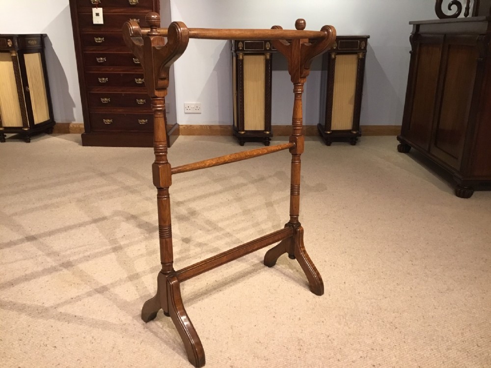 A fine quality oak Late Victorian Period antique towel rail