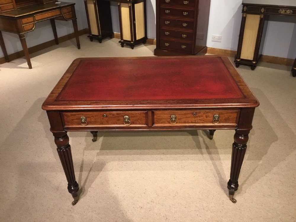 A mahogany Regency Period antique writing table by Wilson of Gt Queen St, London.