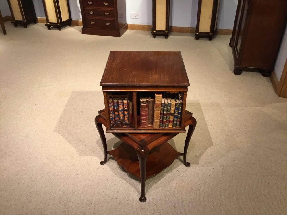 A mahogany Edwardian Period Revolving bookcase by James Shoolbred of London.