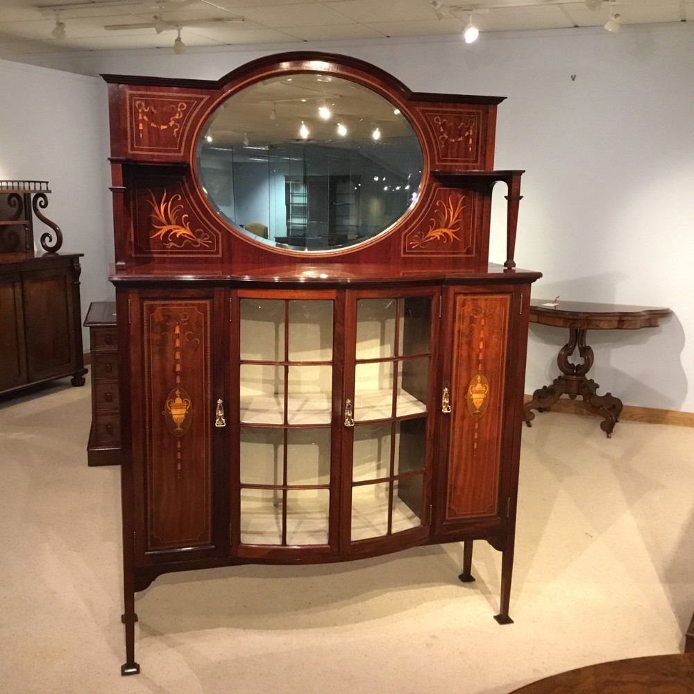 A fine quality Edwardian Period mahogany inlaid display cabinet by Shapland & Petter Of Barnstaple.