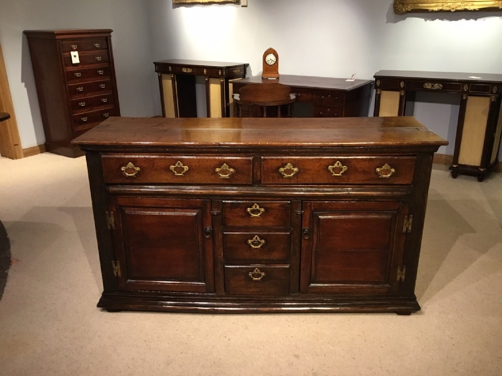 A good 18th Century oak antique dresser base