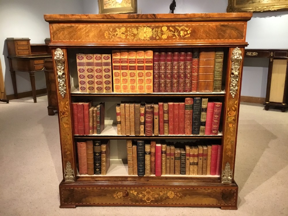A burr walnut & marquetry inlaid Victorian Period antique open bookcase.