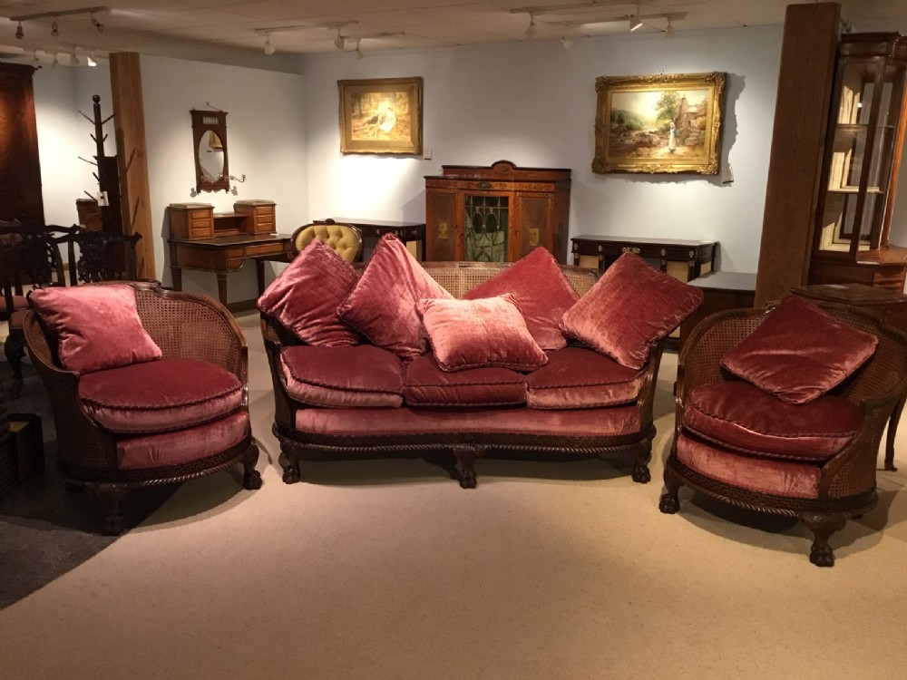 A fine quality large mahogany Chippendale Revival bergere suite