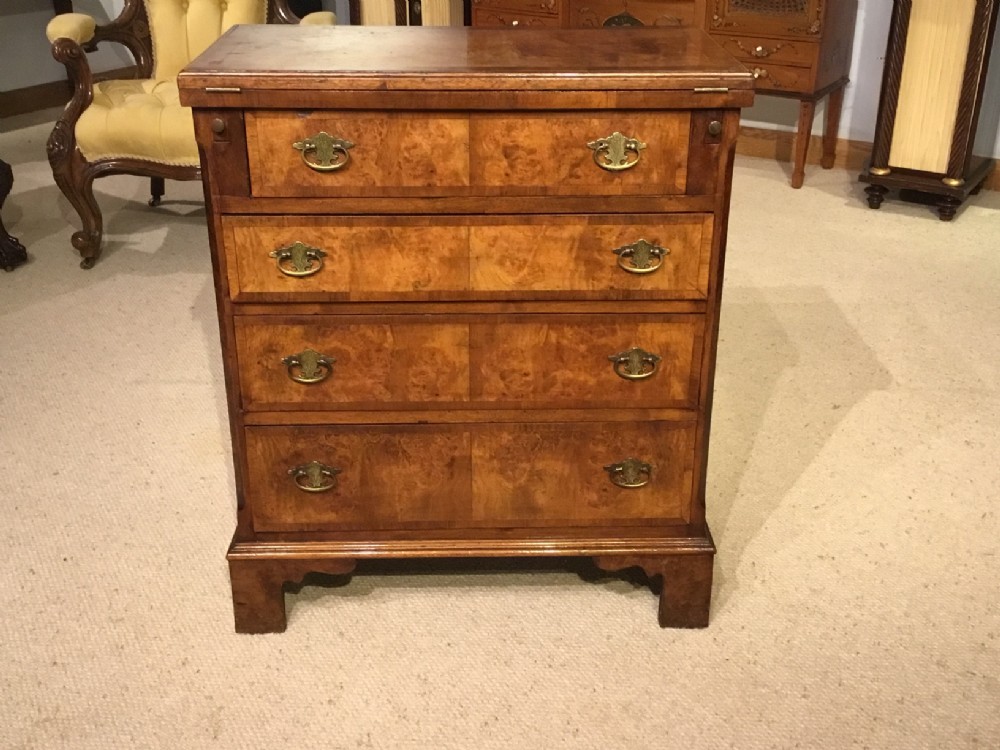 A burr walnut George I Style bachelors chest.