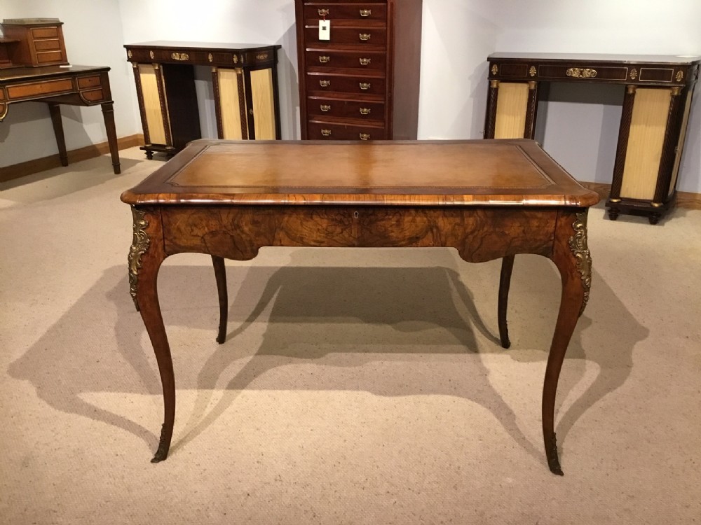 A burr walnut Mid Victorian Period bureau plat.