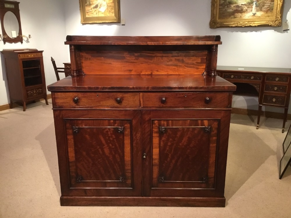 A mahogany William IV Period two door chiffonier