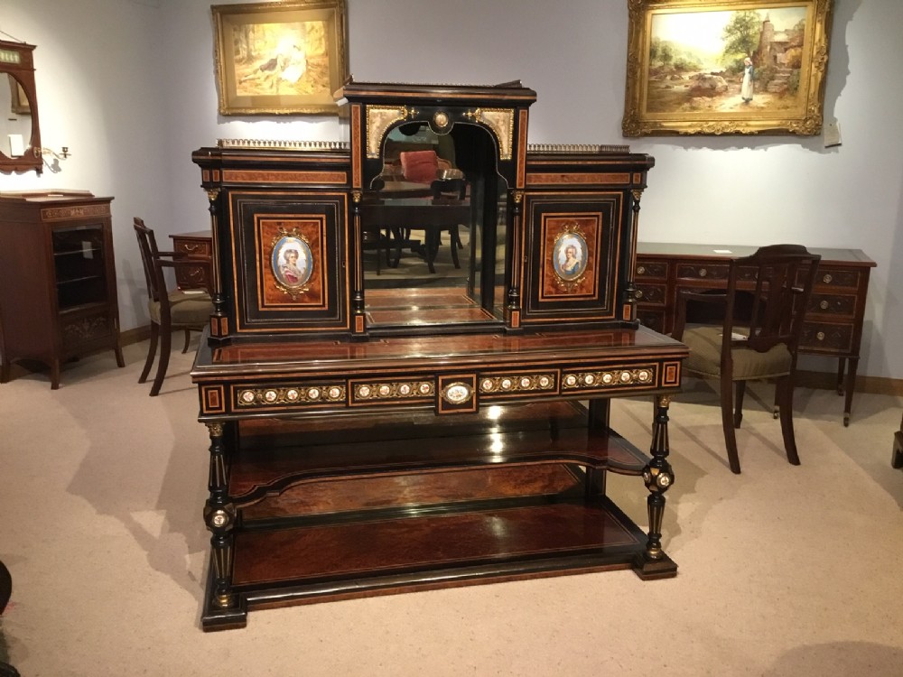 A 19th Century amboyna, ebony and ormolu mounted bonheur du jour with sevres style plaques