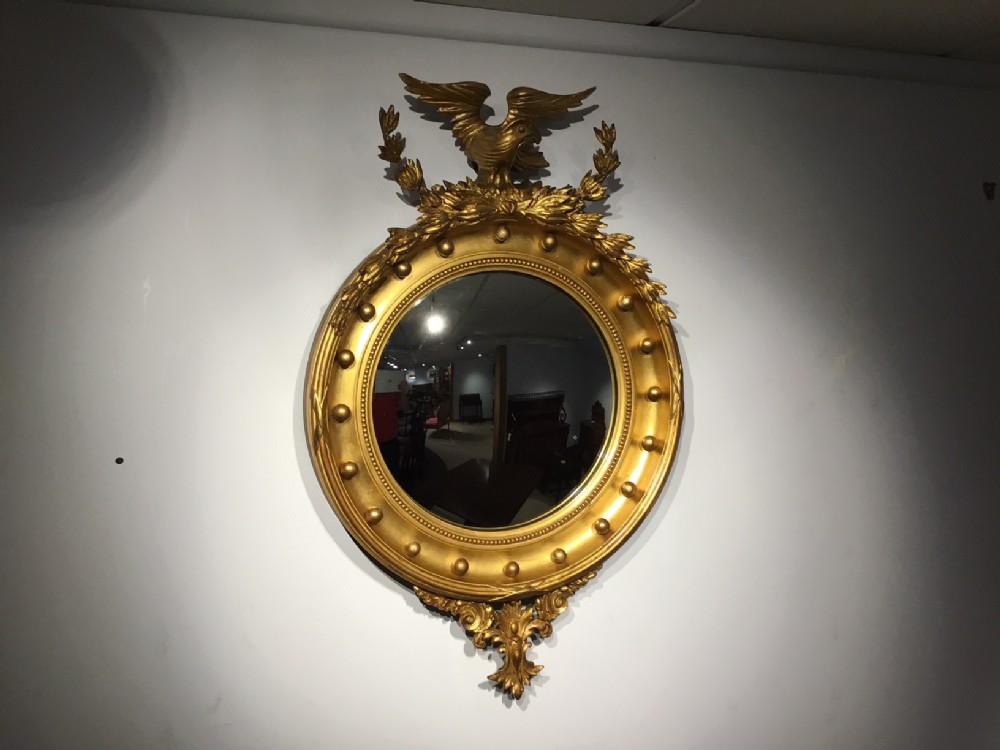 A beautiful gilt-wood & gesso Regency Style convex wall mirror