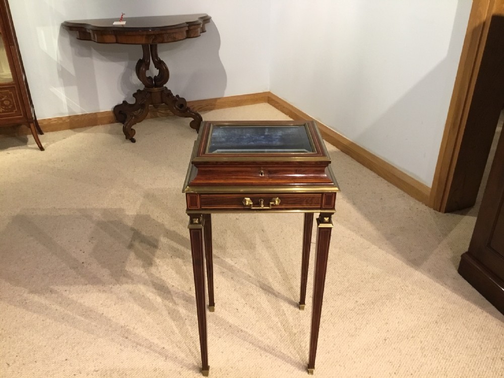 A superb quality rosewood and brass French jewellery cabinet