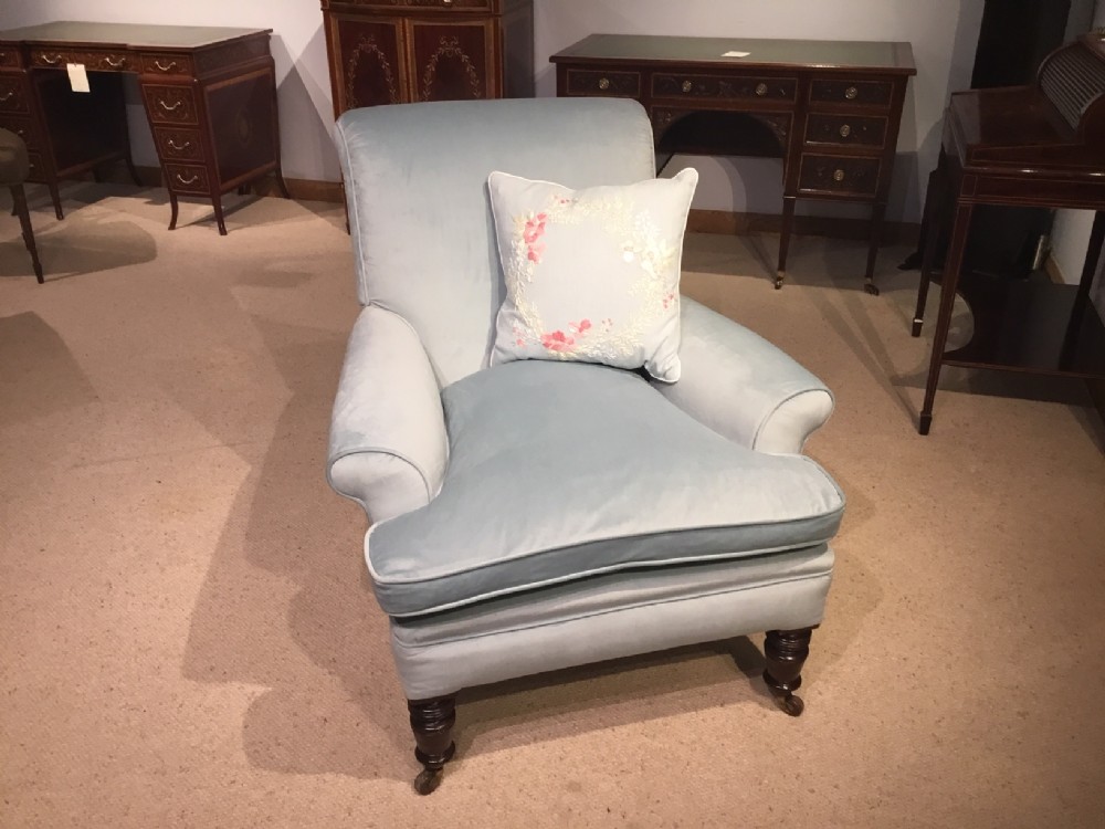 A beautiful Late Victorian Period Howard Style armchair.