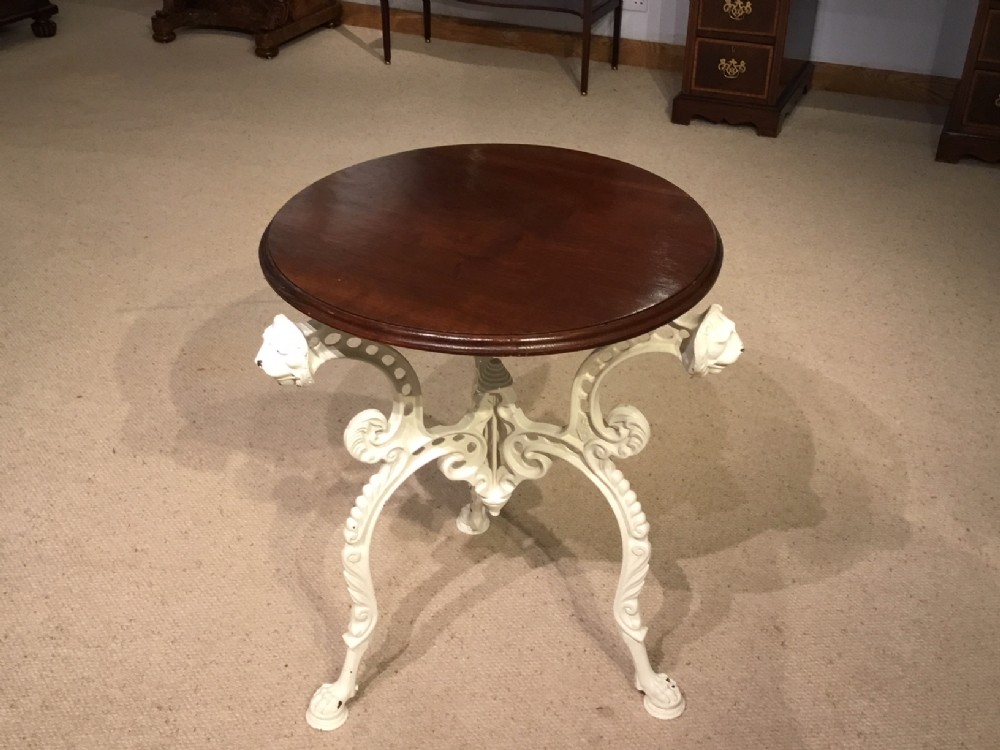 A mahogany & cast iron Victorian Period pub table.